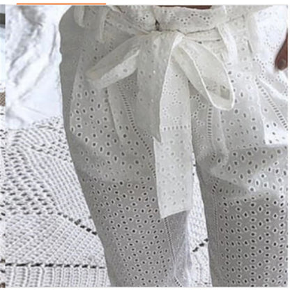 White cutout lace trousers