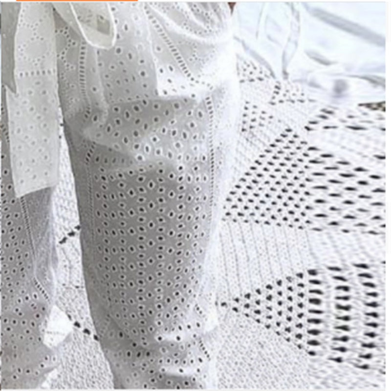 White cutout lace trousers